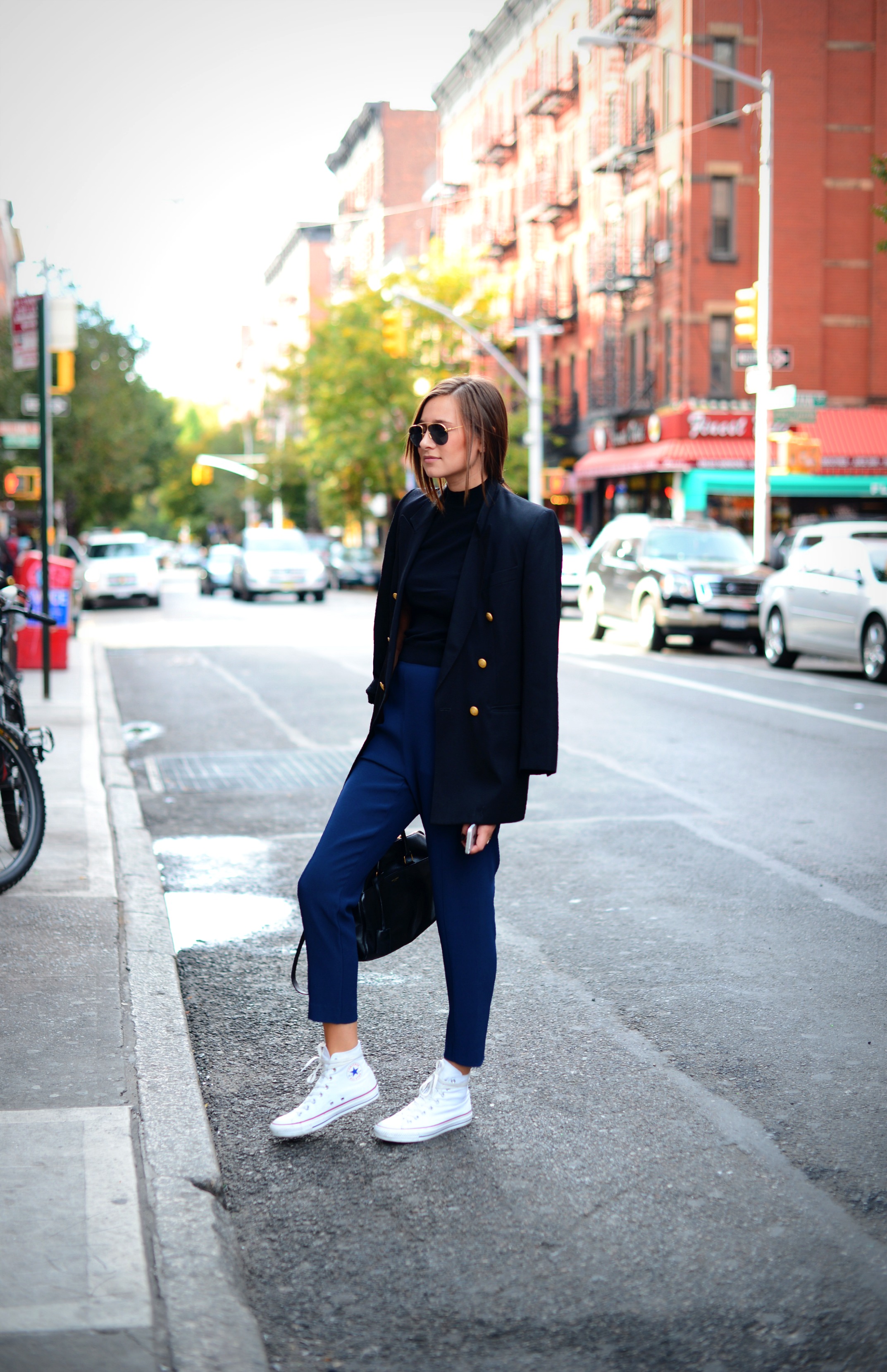 Wear an all navy outfit and embrace your inner sailor like Danielle Bernstein, who wears a vintage blazer and blue cigarette trousers. Trousers: Topshop, Top: ASOS, Vintage Blazer: Own, Shoes: Converse.