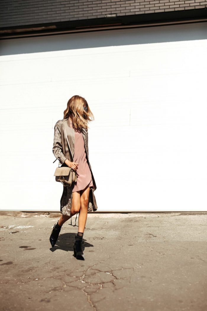 Cristina Monti is rocking this beautiful fall style, consisting of a soft silk jacket, worn over a blush pink slip dress and paired with black stilettos for an authentic, feminine style. Dress/Jacket: All Saints, Boots: Mimosa.