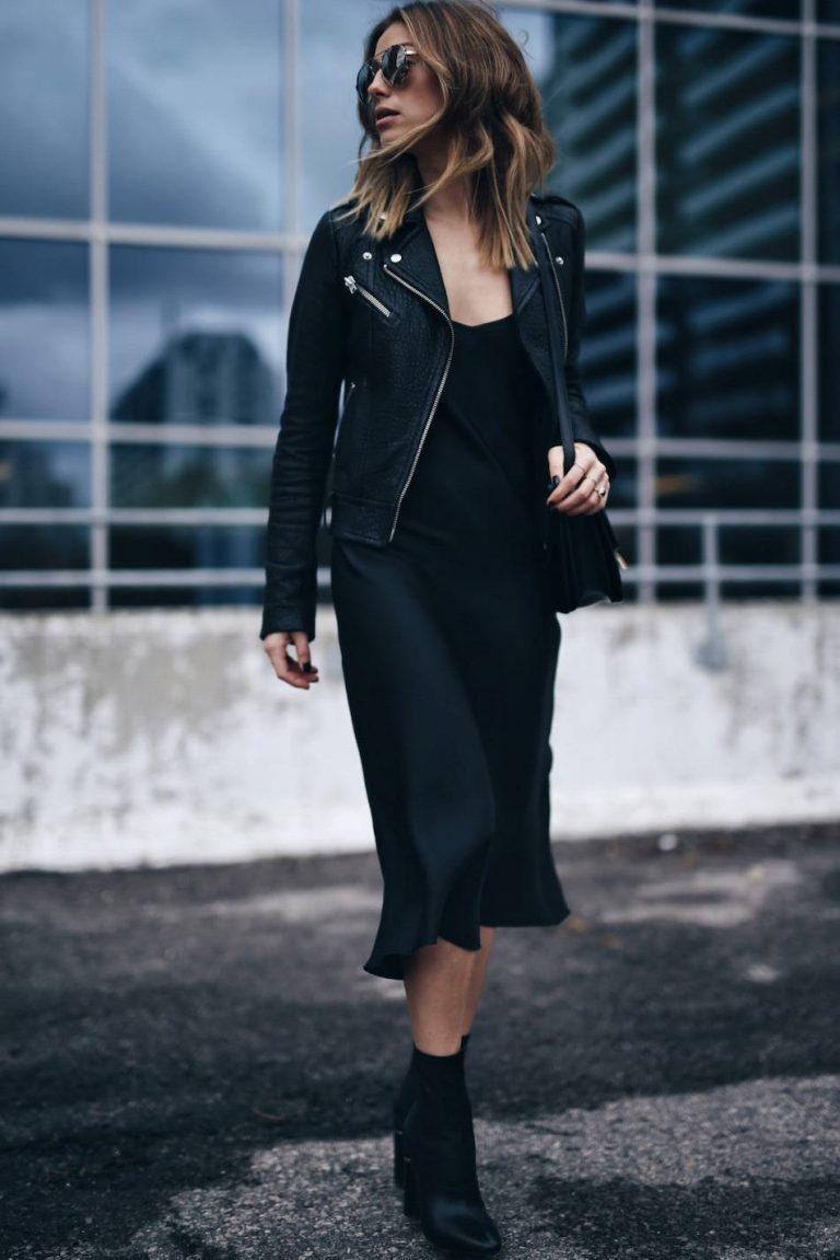 Jill Lansky pairs a gorgeous black slip dress with a slick leather jacket and heeled black ankle boots for a casual but elegant street style. Jacket: Mackage, Dress: John Patrick, Bag: Celine, Boots: Philip Lim.